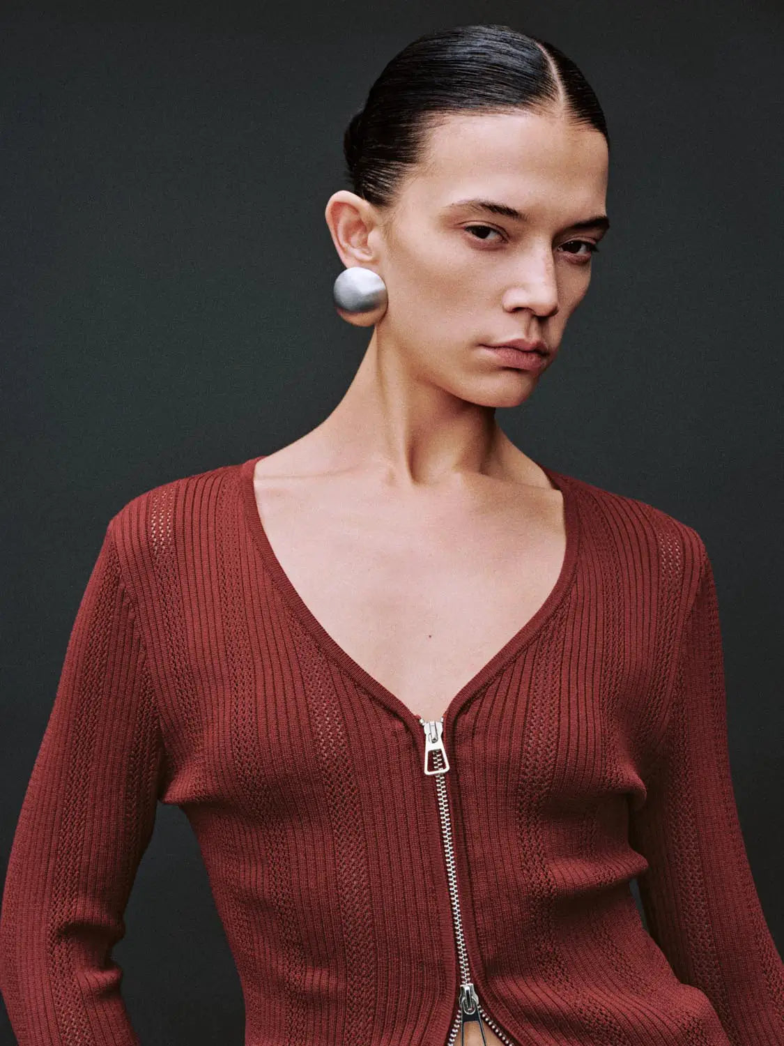 Zip Up Front Knitted Cardigan in burgundy with a silver front zipper and textured knit.