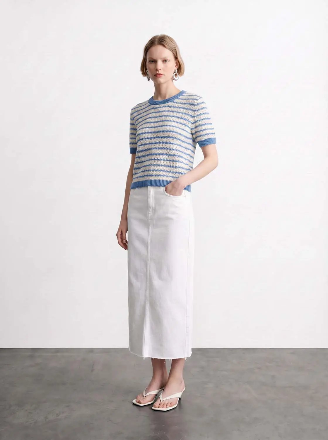 Cotton striped textured knit rib-trim T-shirt in blue and cream, short sleeves, paired with a white midi skirt