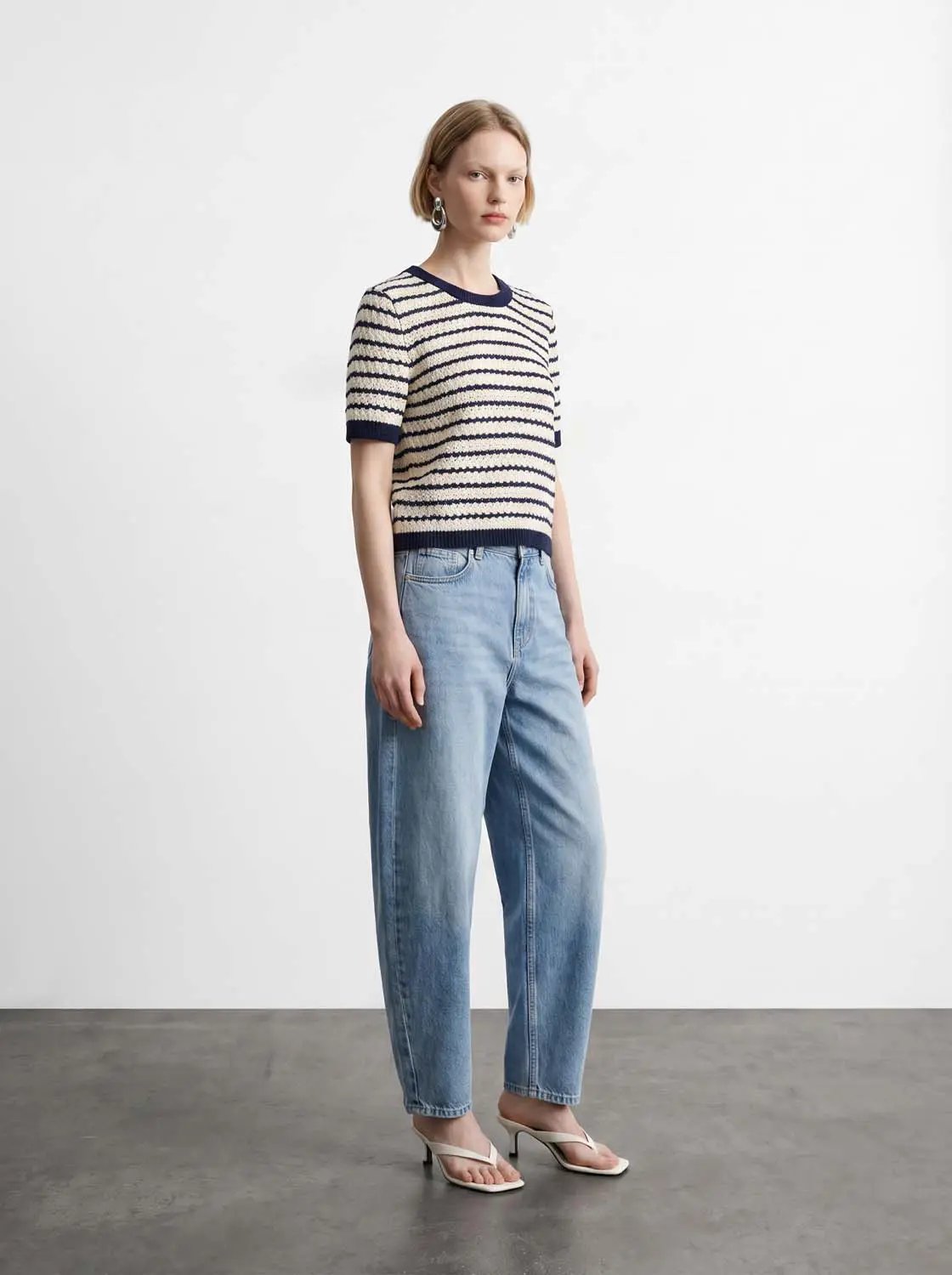 Cotton striped textured knit rib-trim T-shirt in cream and navy stripes.