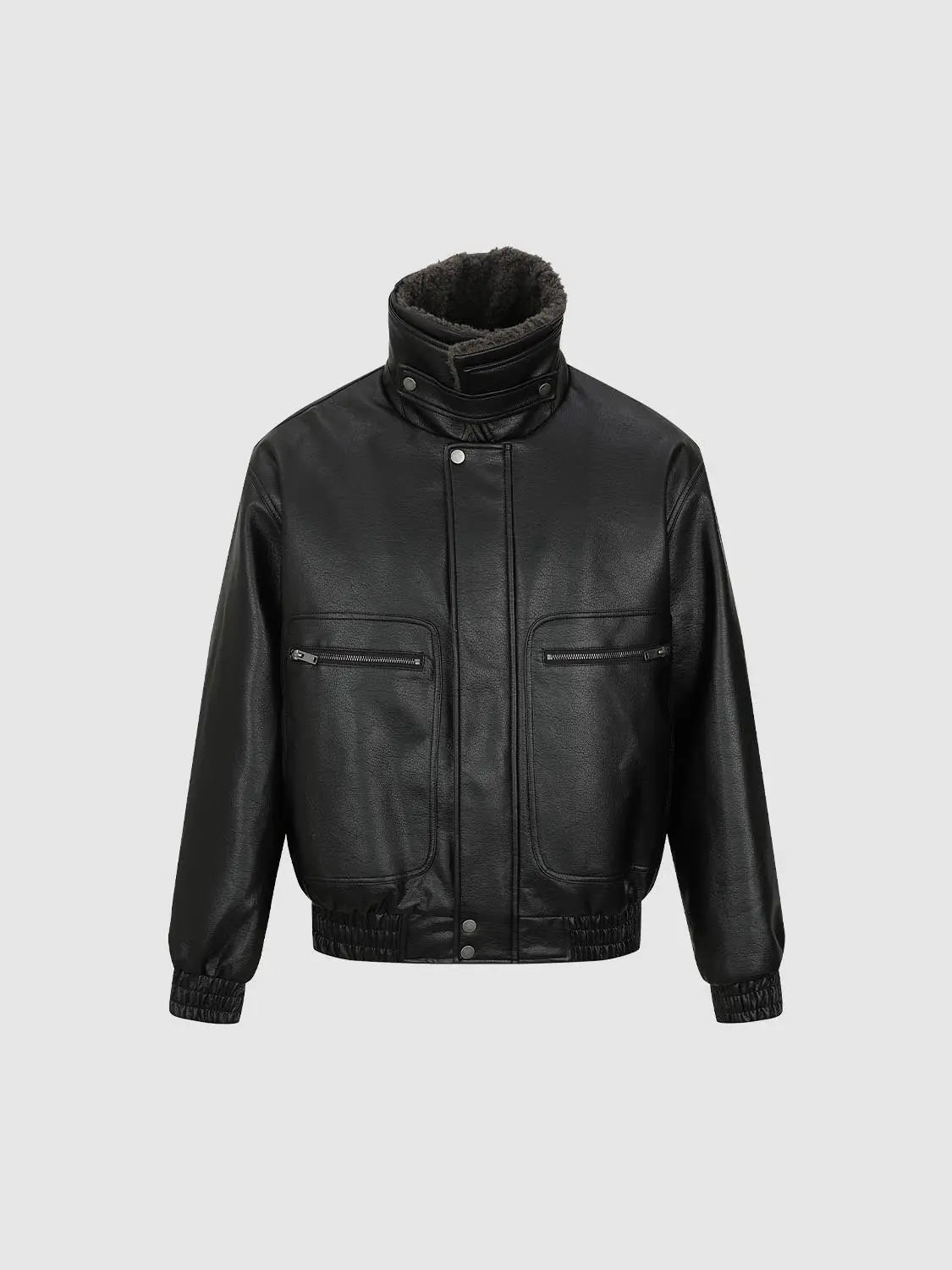 Padded Jacket in black faux leather with a shearling-lined collar, zip pockets, and elastic hem and cuffs.