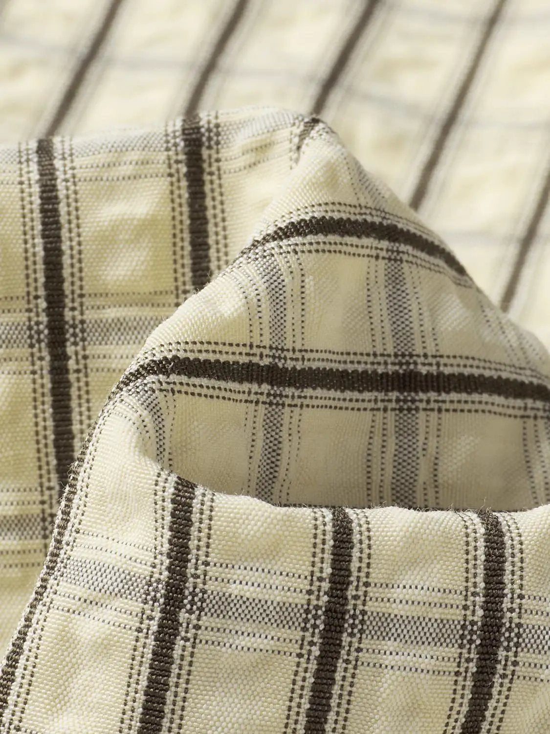 Button-front shirt in beige plaid with brown grid lines; Urban Revivo Fashion.