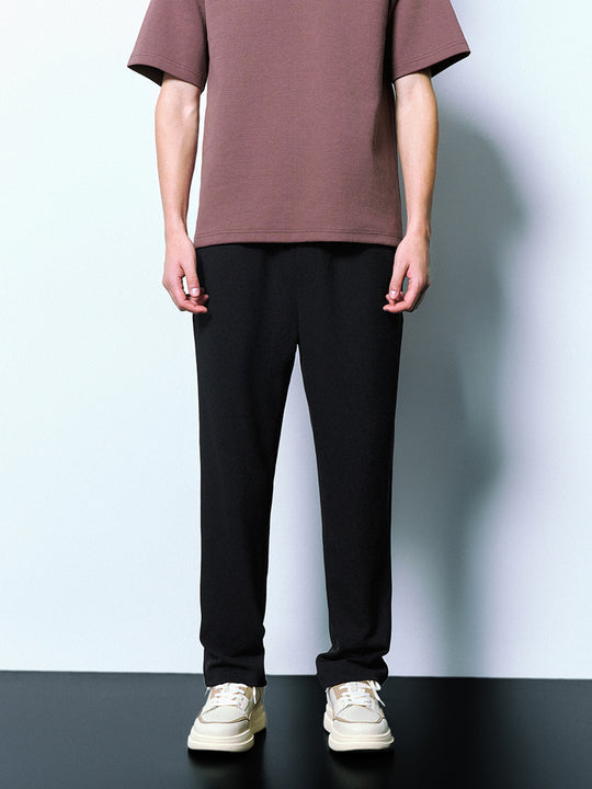 Pantalones de corte zanahoria con cordón en la cintura