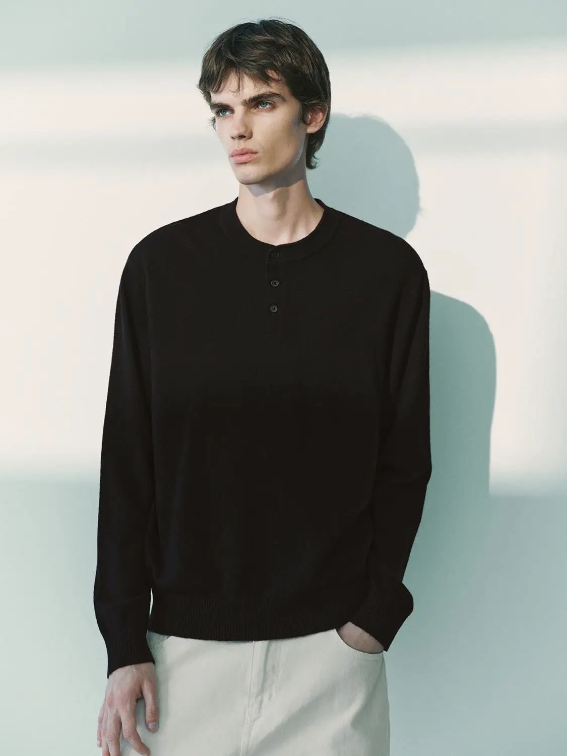 Knit T-Shirt in black by Urban Revivo Fashion; long-sleeve knitted top with 3-button henley placket.
