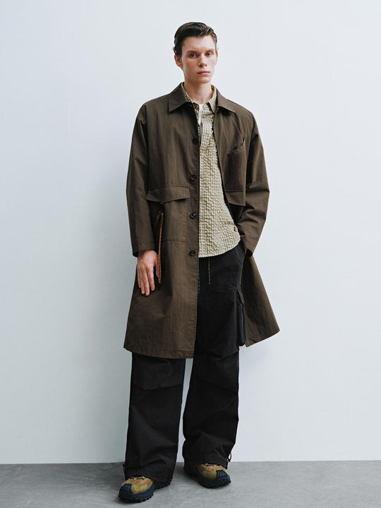 Manteaux trench oversize boutonnés