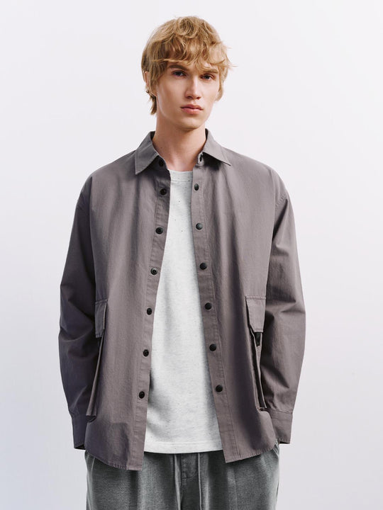 Camisas holgadas con bolsillo de solapa
