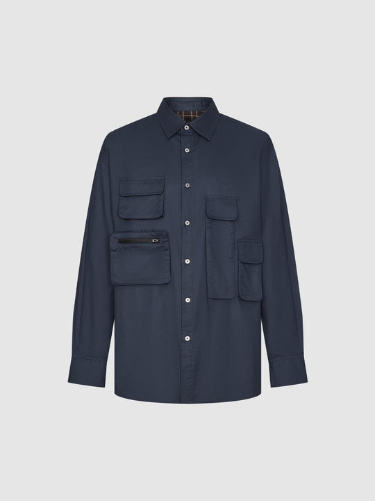 Camisas de corte holgado con bolsillos de solapa