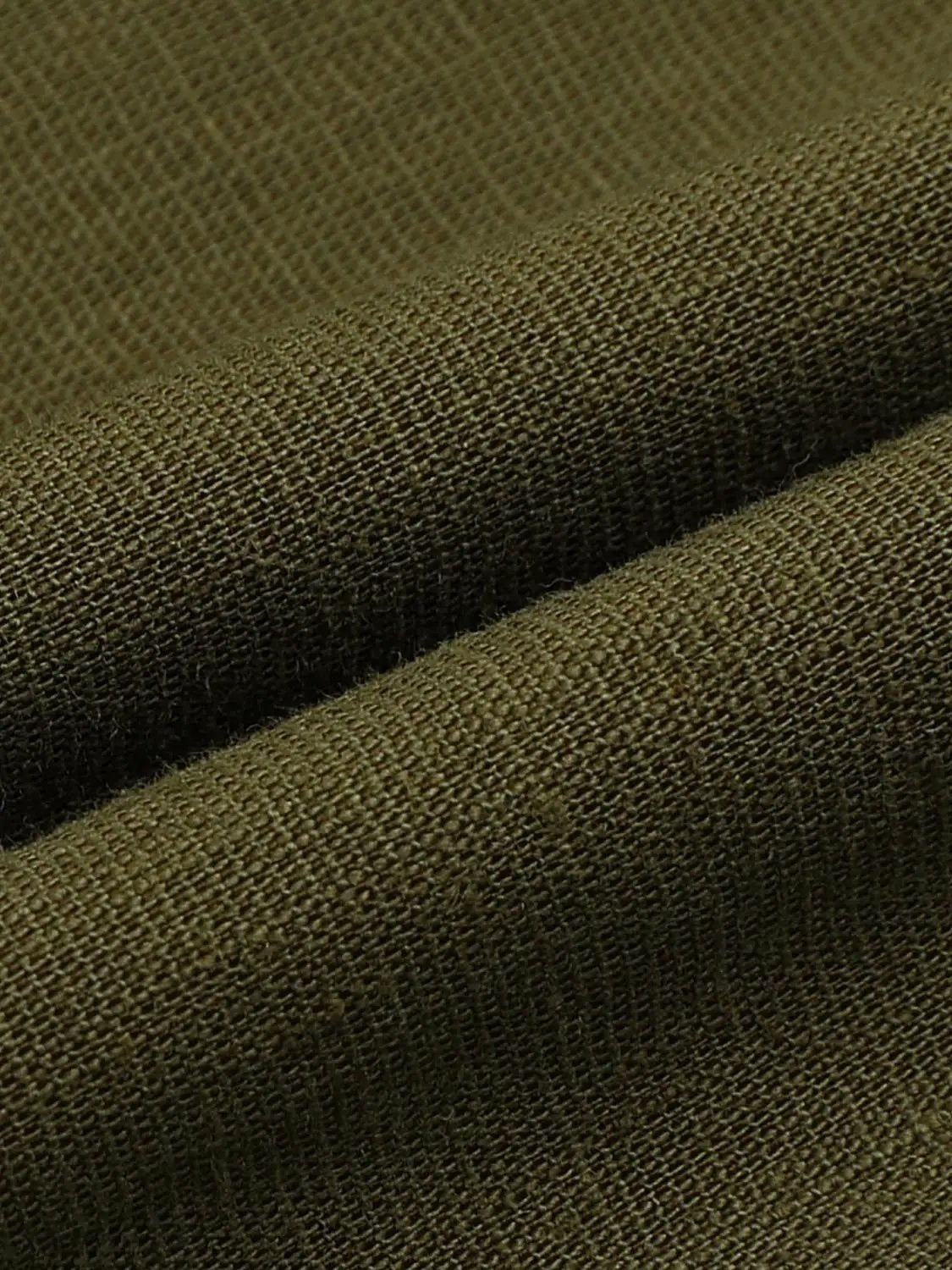 Button-front shirt fabric in olive-brown with tight woven texture