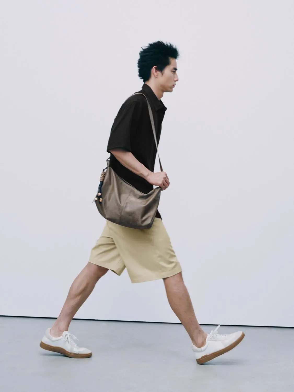 Open-Front Shirt, black, worn by a man with beige shorts and a tan crossbody bag