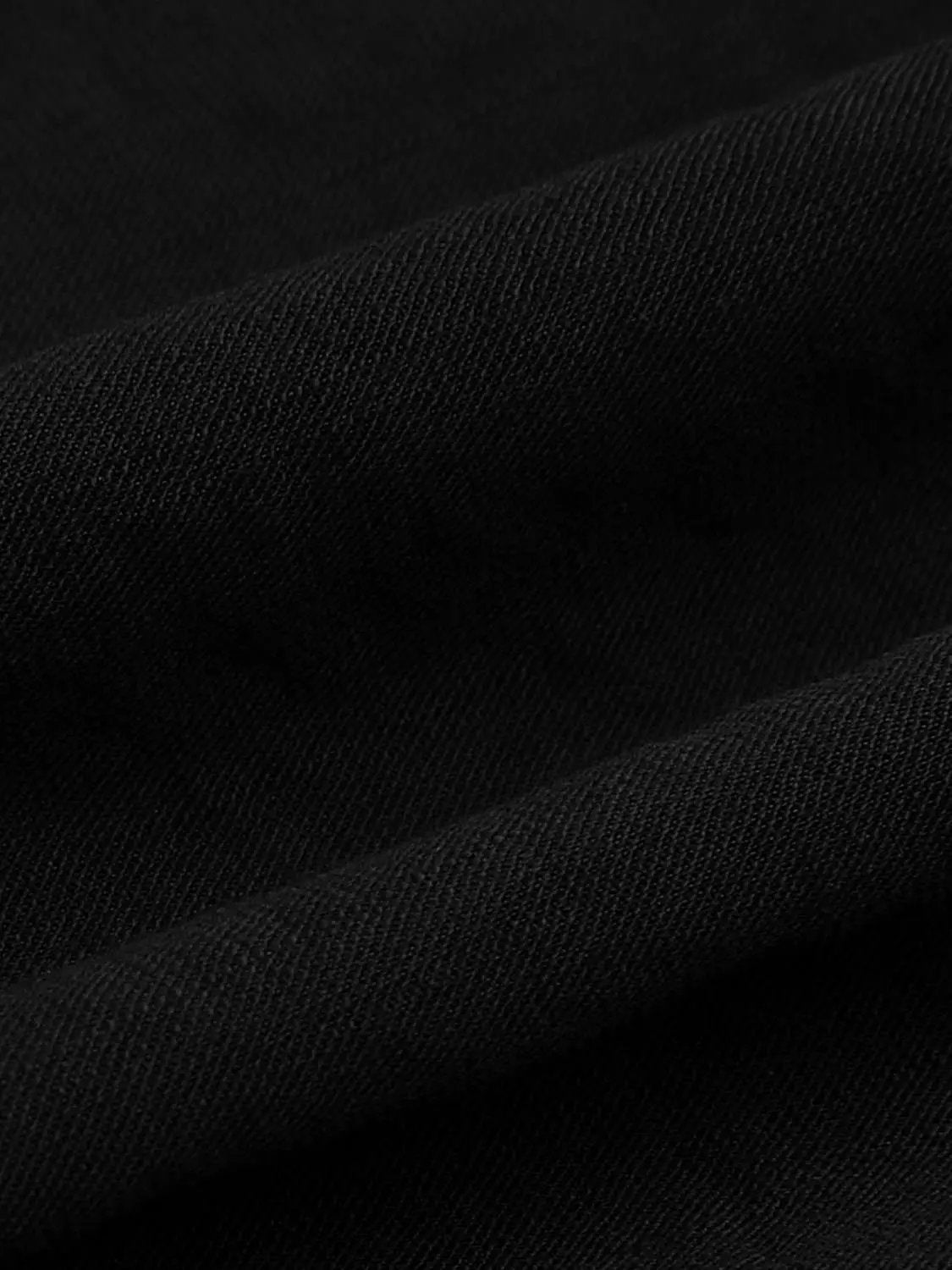 Open-Front Shirt in black textured fabric, close-up detail