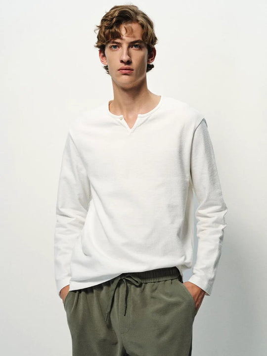 T-shirt in cotone a maniche lunghe con collo a bottoni tinta unita