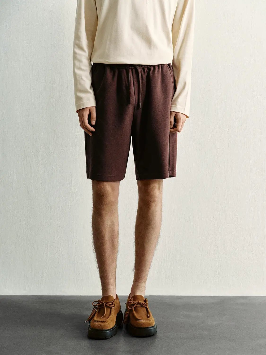 Elastic Drawstring Waist Cotton Blend Shorts on model; dark brown color, casual pull-on style.