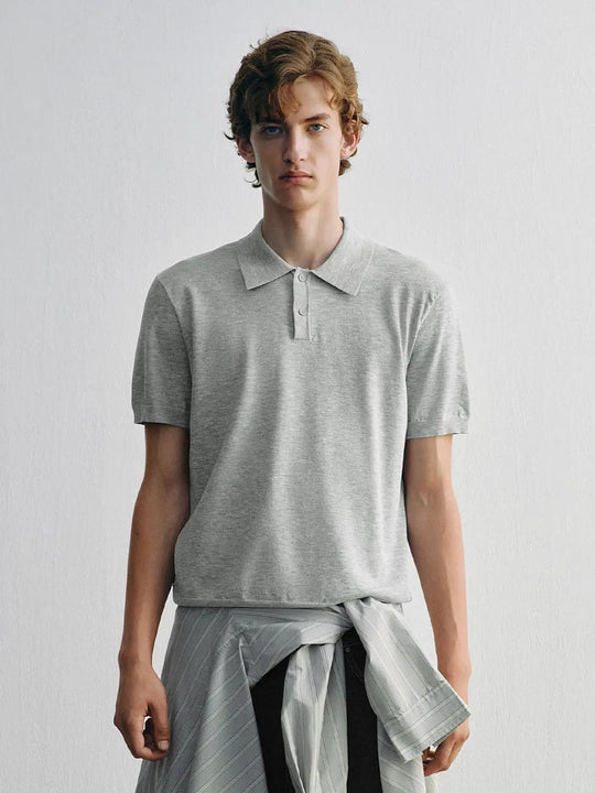 Polo de punto jaspeado de manga corta con tapeta de botones