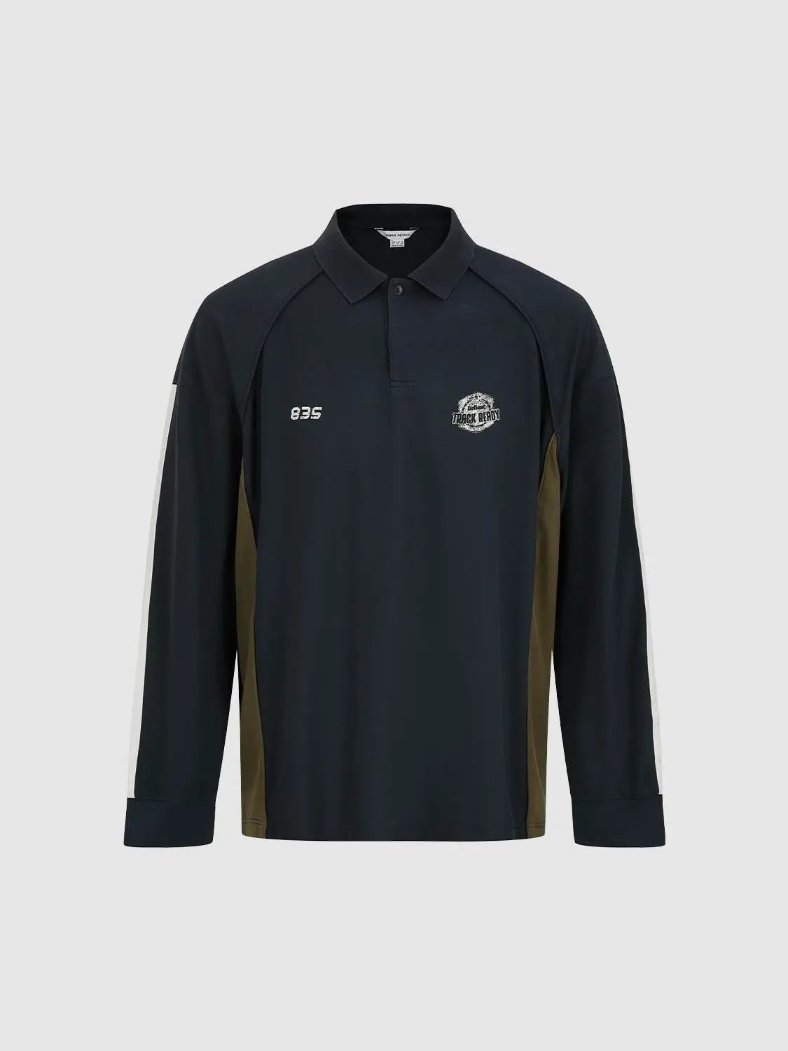 Polo shirt, navy long-sleeve with olive side panels and white arm stripe; 835 embroidery and Track Ready patch.