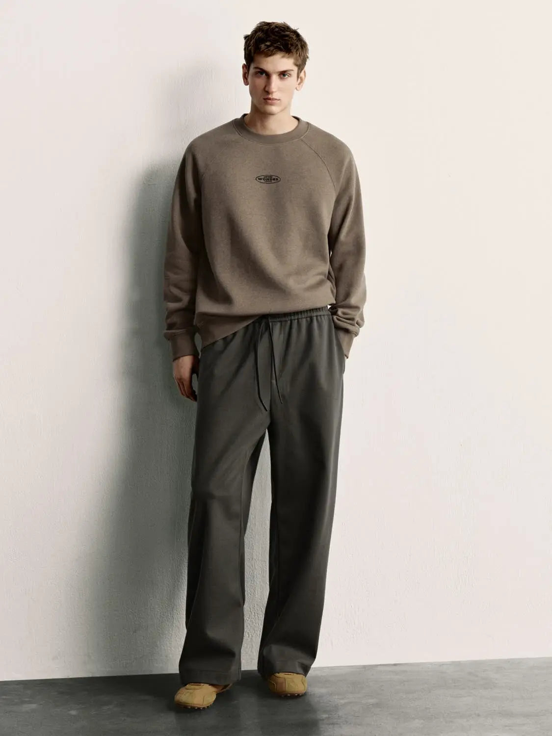 Sweatshirt in taupe with small chest logo by Urban Revivo Fashion