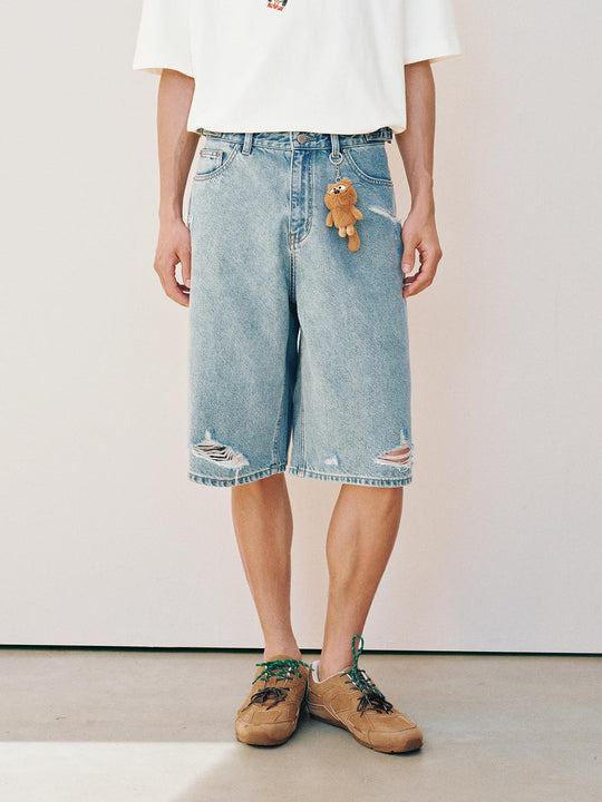 Baumwollshorts mit weitem Bein im Used-Look und mit Rissen