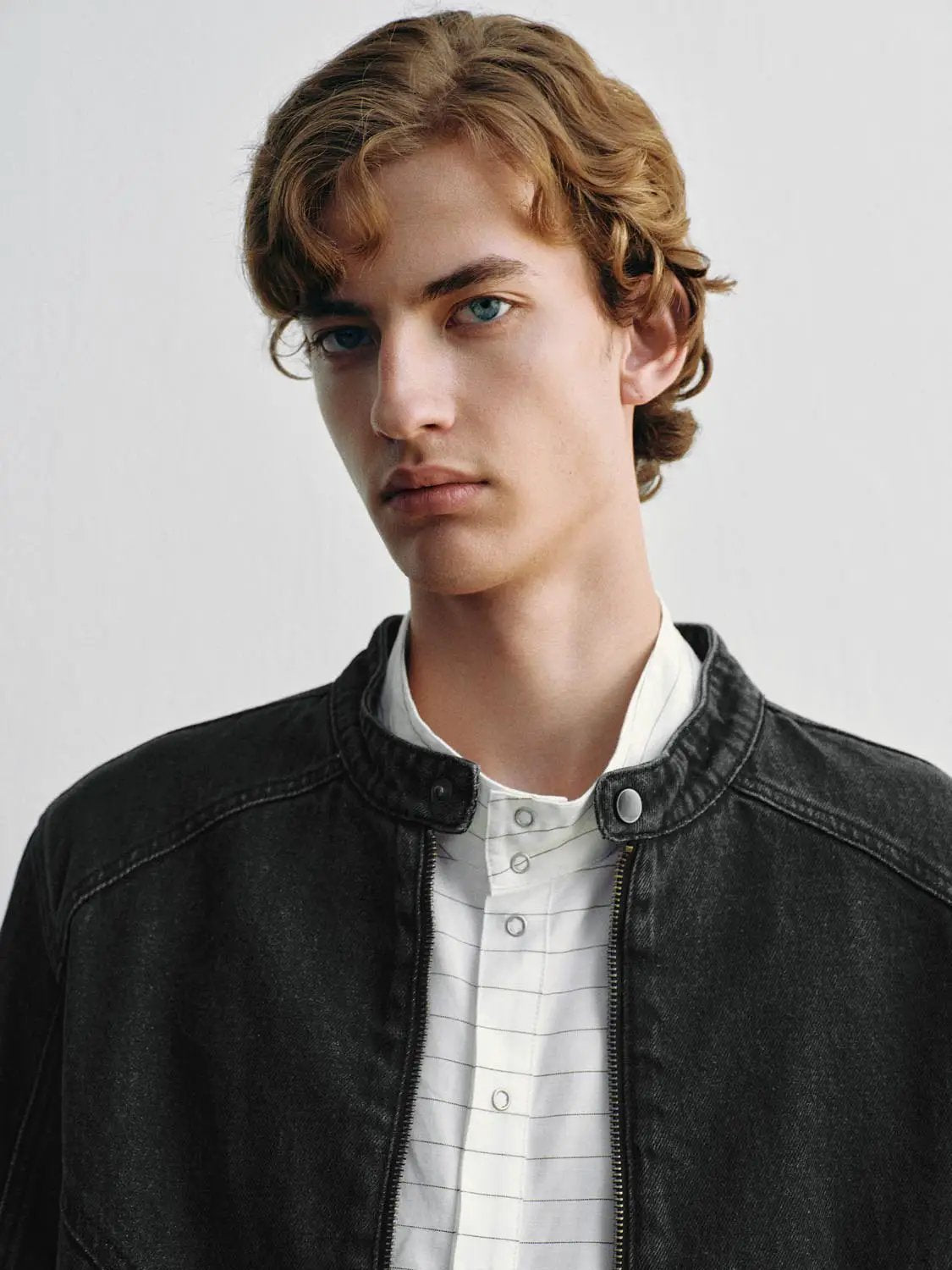 Denim jacket, black wash with zip front and snap-button stand collar