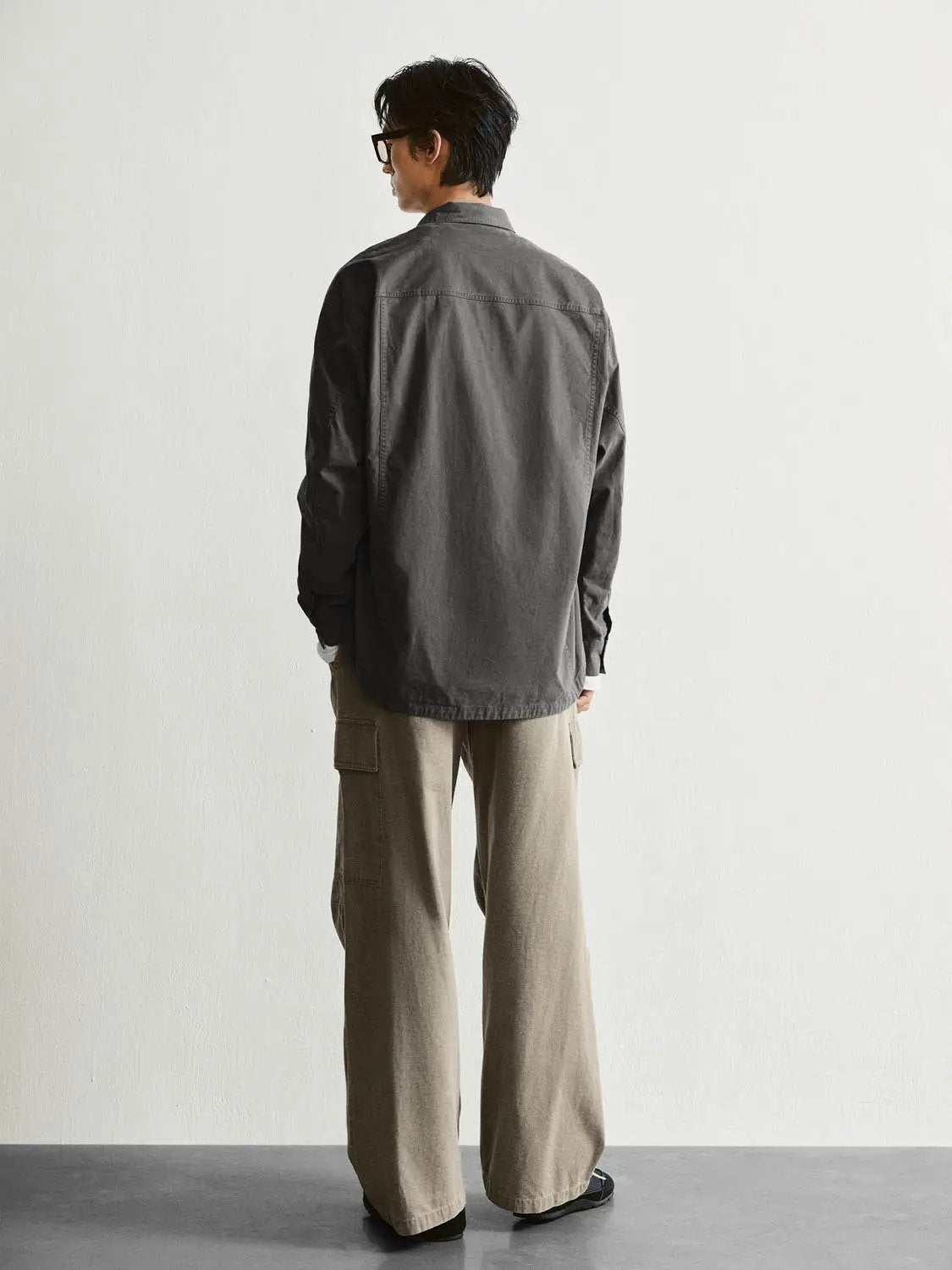 Button-front shirt by Urban Revivo Fashion; charcoal gray, back view, paired with beige cargo pants