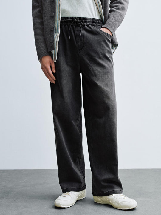 Jeans a gamba larga con coulisse frontale