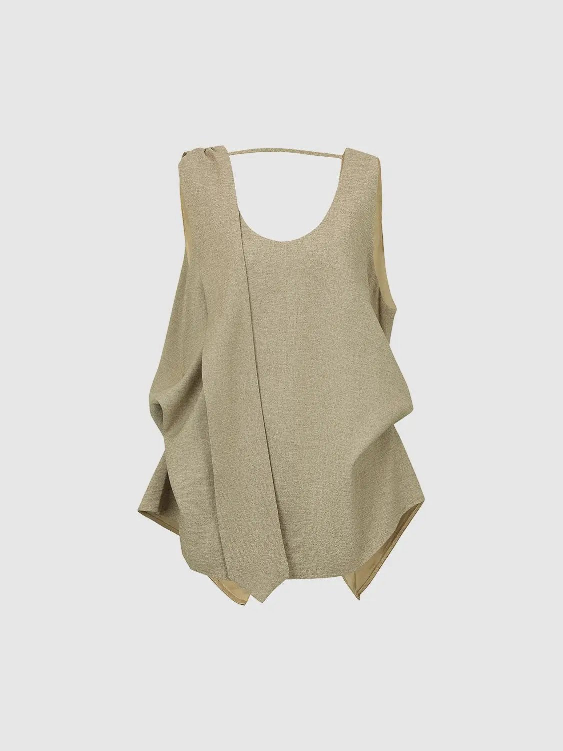 Textured draped-overlay beige sleeveless blouse for everyday wear.