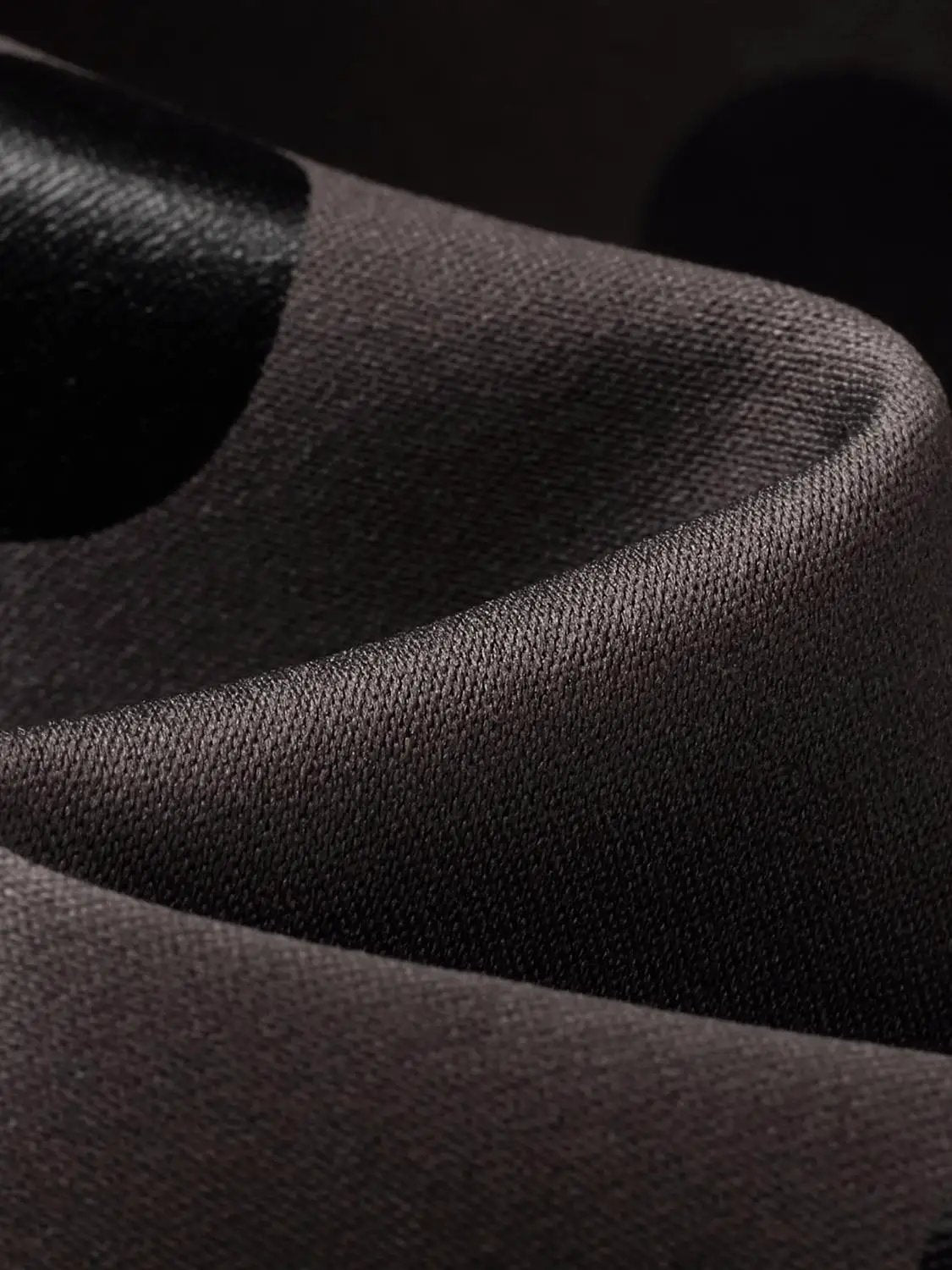 A-Line Dresses black fabric close-up by Urban Revivo Fashion