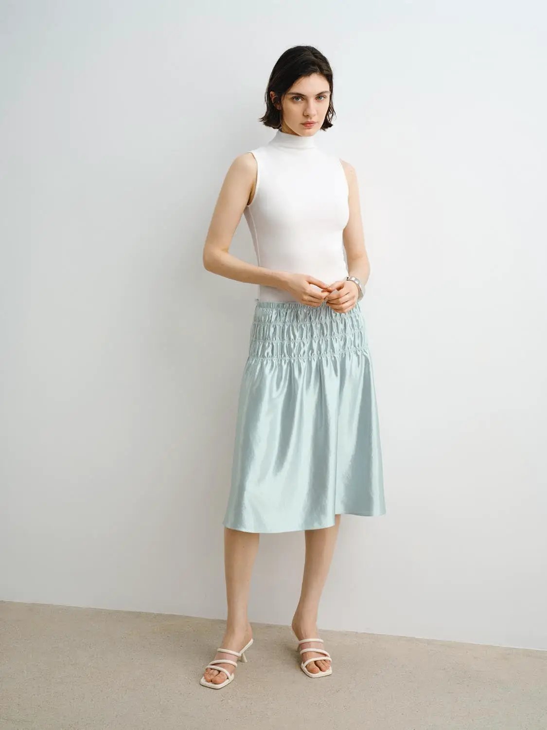 Tank Top by Urban Revivo Fashion; white sleeveless high-neck top with light-blue skirt (2-piece set)