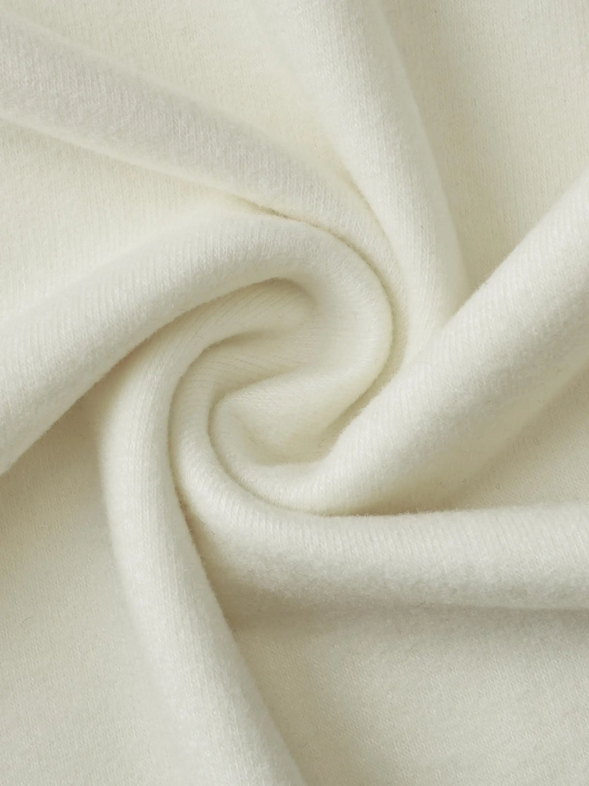 T-shirt cream knit fabric close-up; soft textured textile by Urban Revivo Fashion