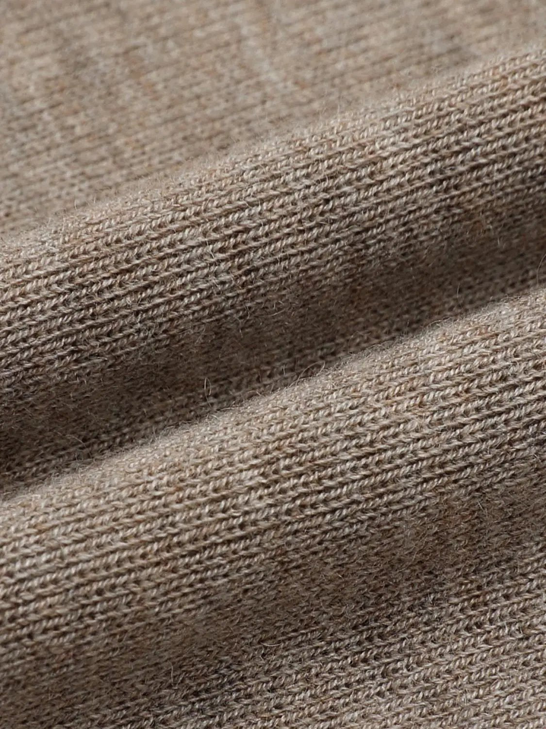 Ribbed Fitted Mock Neck Long Sleeve Sweater fabric close-up in warm brown knit