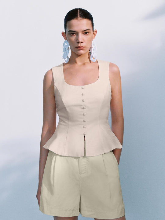 Top peplum sopra la testa