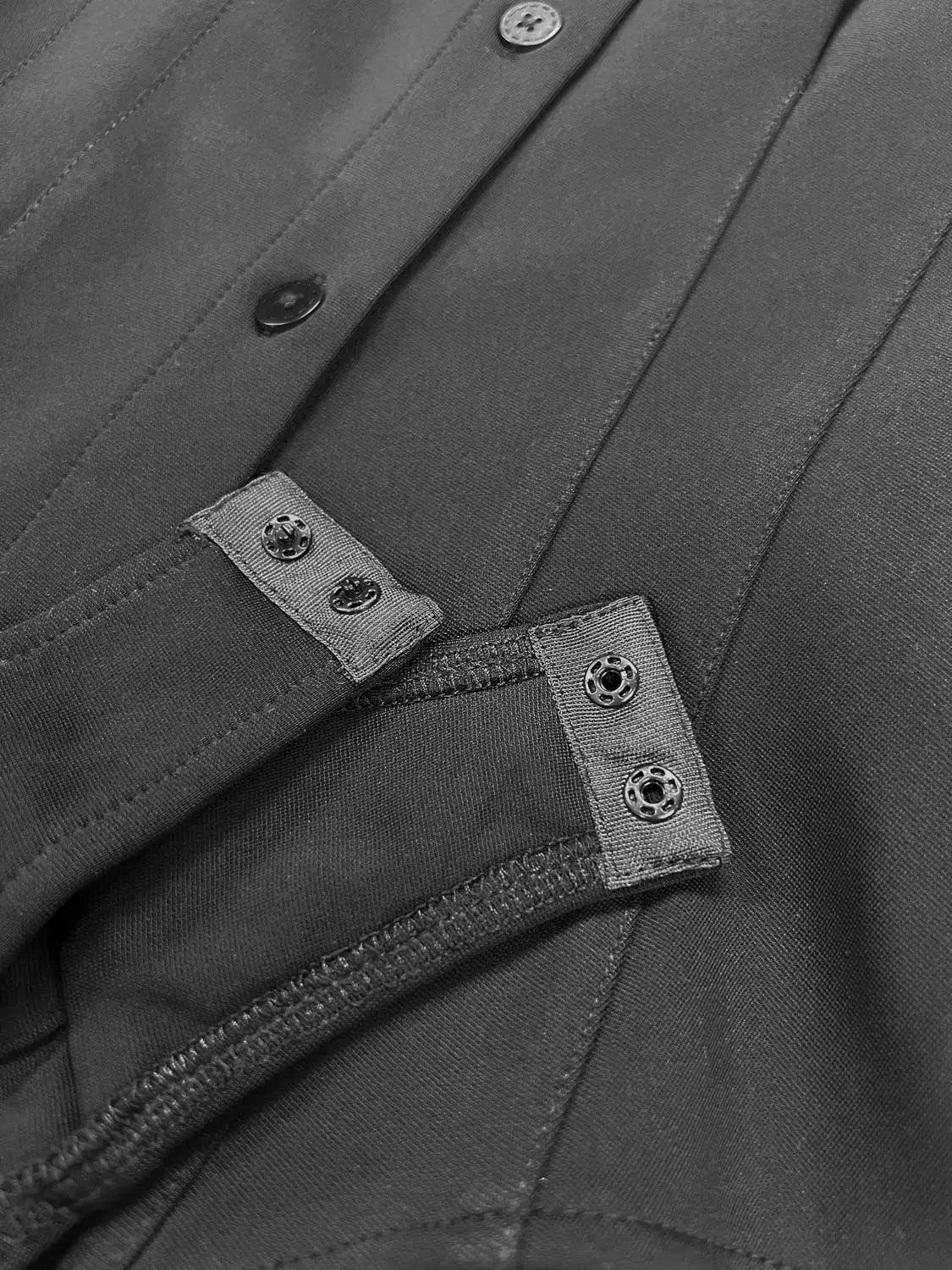 Button-front black shirt with tabbed cuffs and metal buttons.
