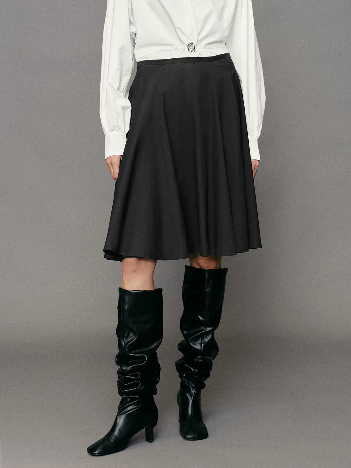 Pleated high-waisted cotton A-line skirt by Urban Revivo Fashion, black, midi length.