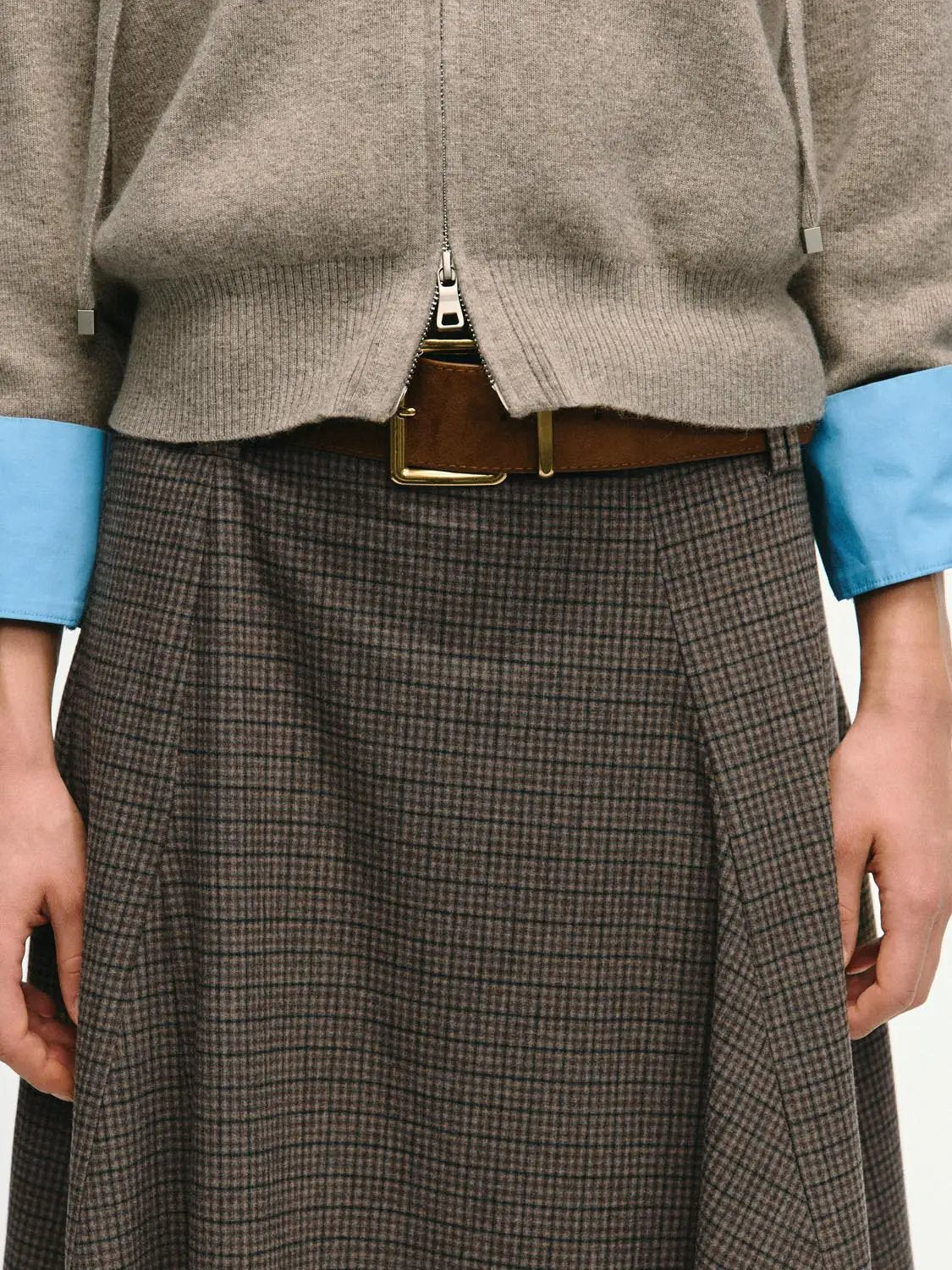 Checked mid-rise belted A-line midi skirt in brown plaid by Urban Revivo Fashion.