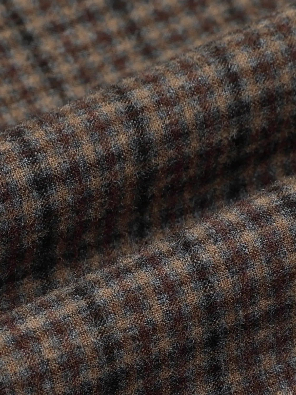 Checked mid-rise belted A-line midi skirt; brown and black tweed fabric texture