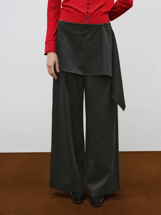 Pantalones de pernera ancha y talle medio, cruzados, con rayas y diseño asimétrico