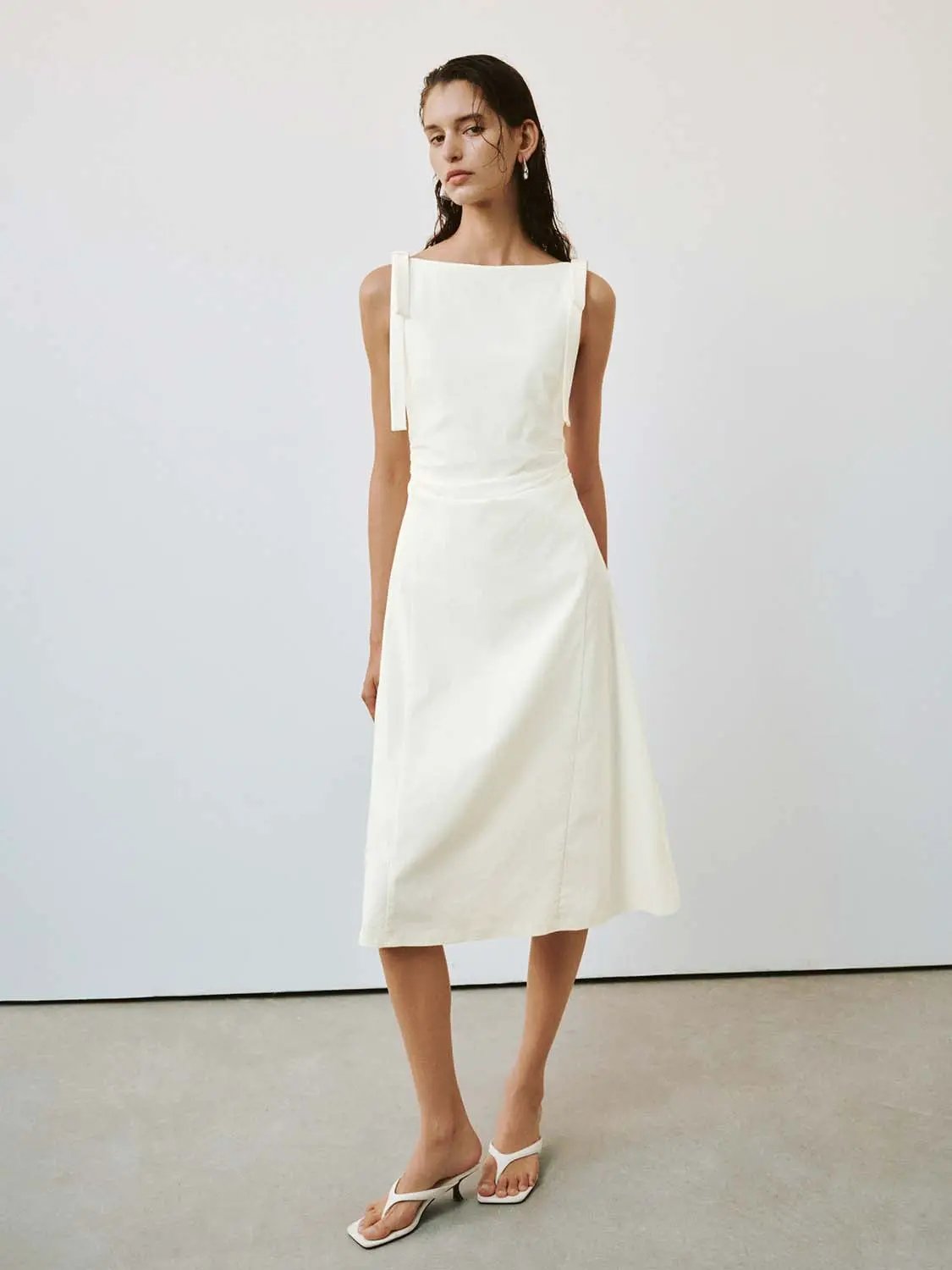 Viscose-blend sleeveless A-line midi dress in white with a nipped waist, Urban Revivo Fashion.