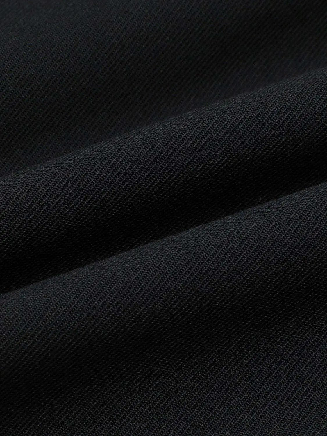Flared Pleated Elastic Waist A-Line Midi Dress by Urban Revivo Fashion in black textured fabric (close-up)
