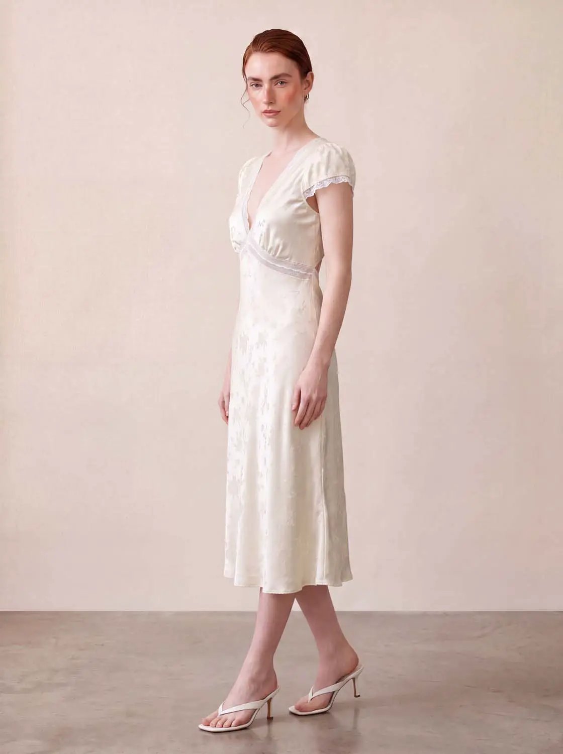 Floral Lace Trim V-neck Puff Sleeve A-line Midi Dress in ivory satin by Urban Revivo Fashion