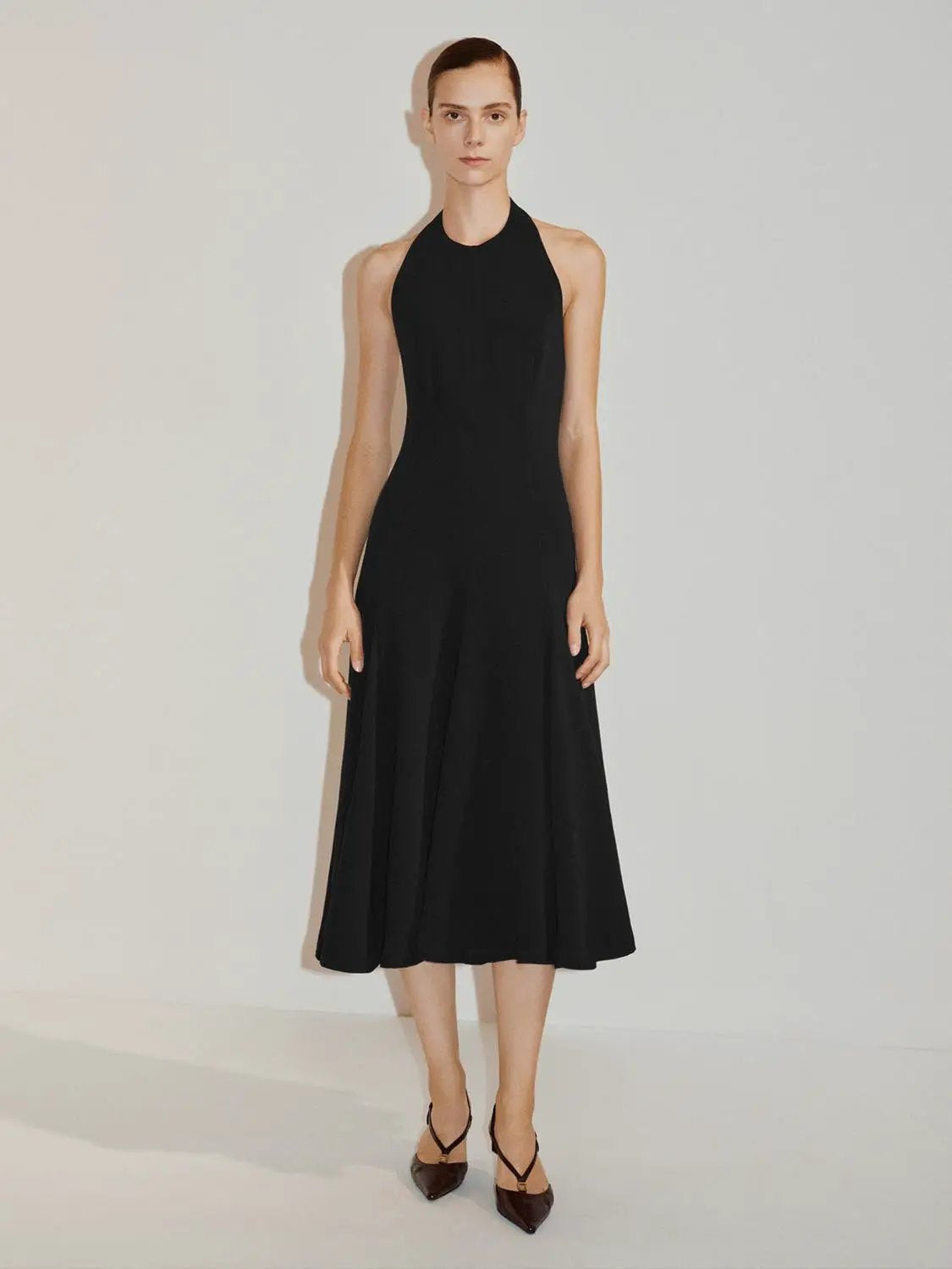 Fitted high-neck sleeveless A-line black maxi dress by Urban Revivo Fashion