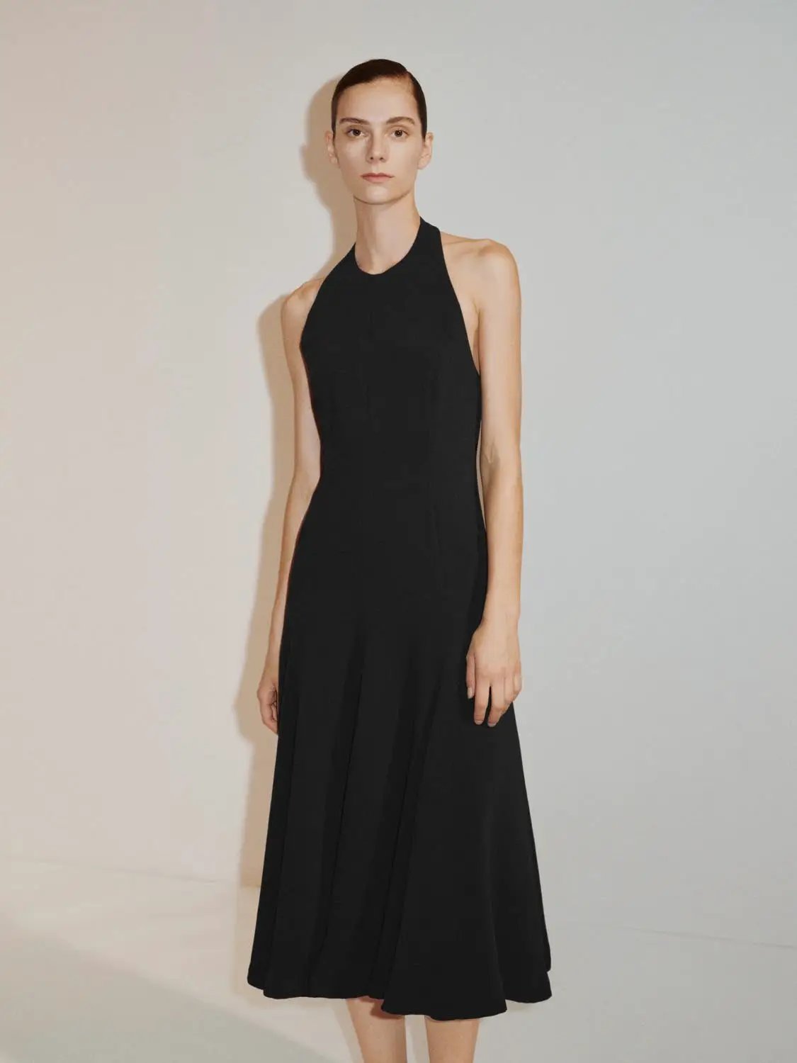 Fitted high-neck sleeveless A-line black maxi dress by Urban Revivo Fashion