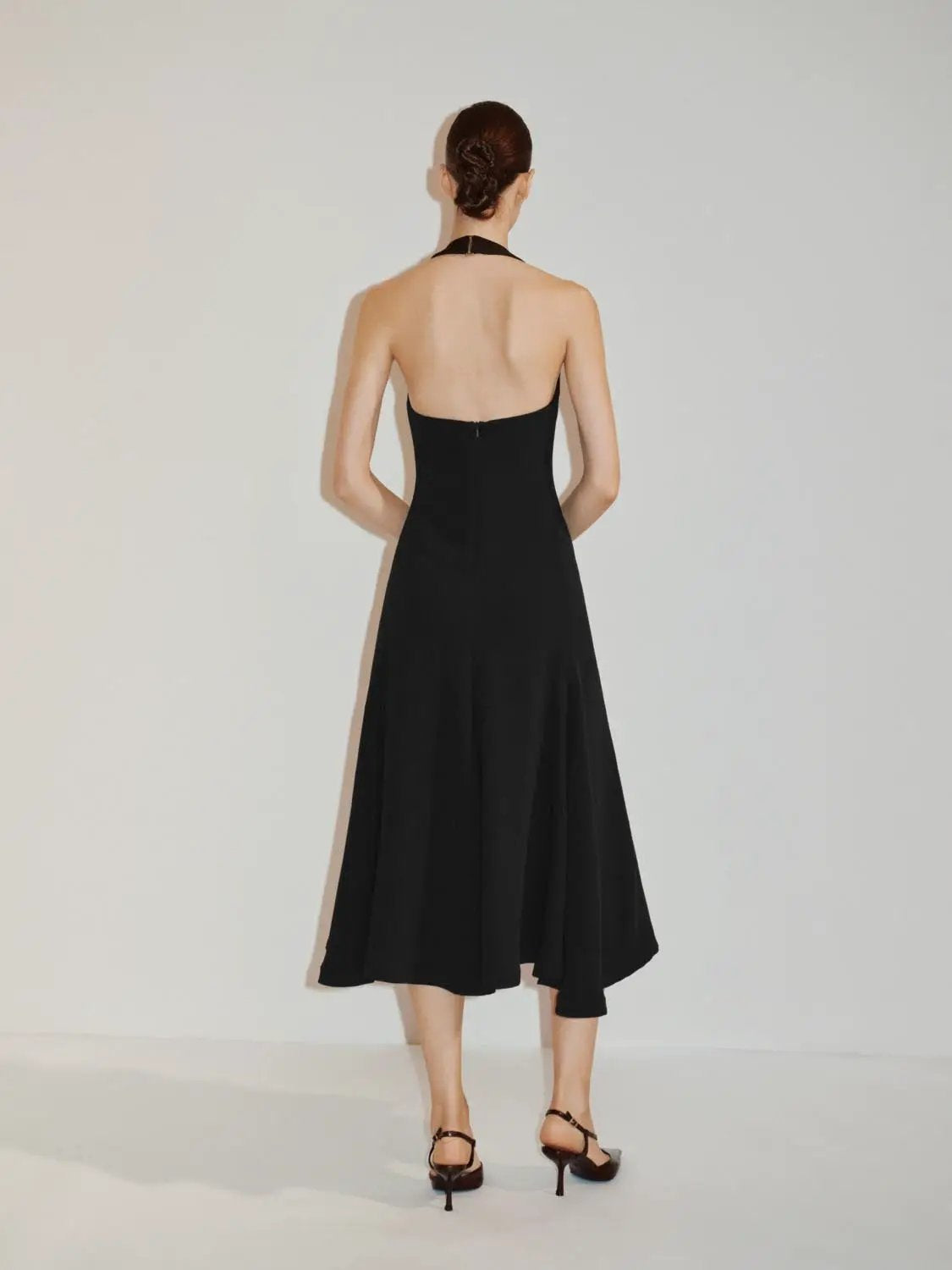 Fitted high-neck sleeveless black A-line maxi dress with center back zipper