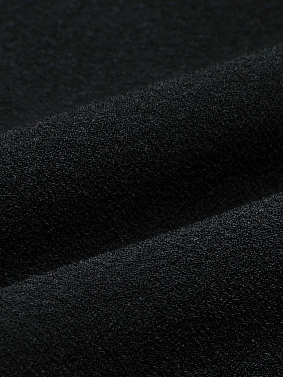Fitted high-neck sleeveless A-line maxi dress in black fabric with textured weave