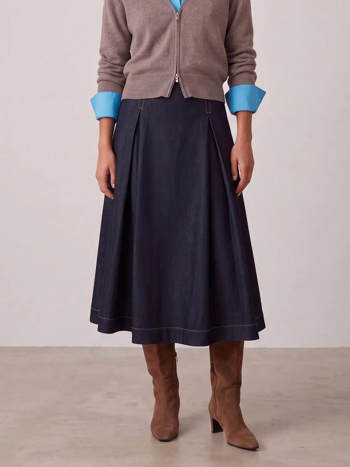 A-Line Midi Stretch Denim Skirt in navy with front pleats