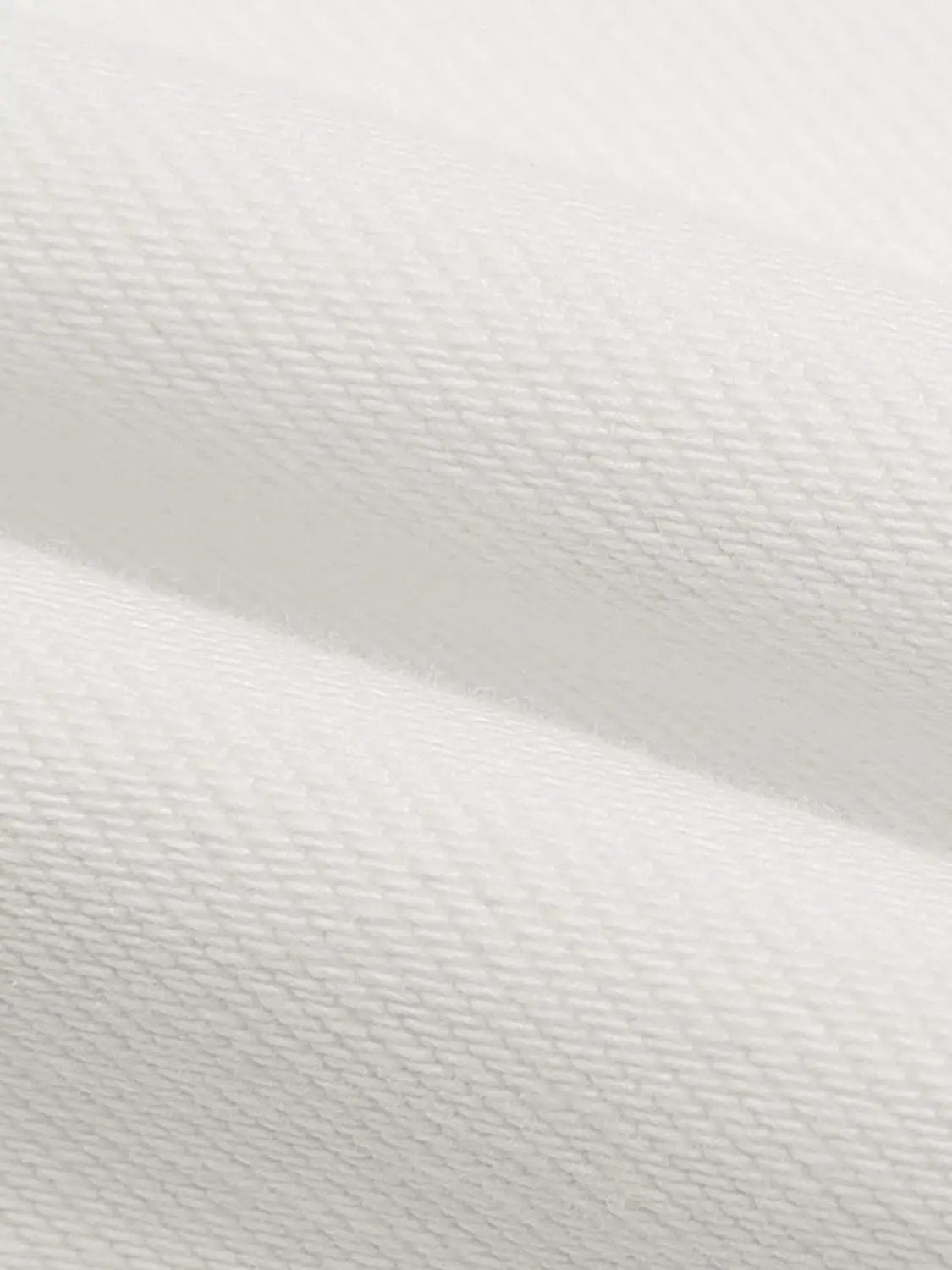 Mid Rise Belt Loop Cotton Stretch Flared Jeans - white textured fabric background