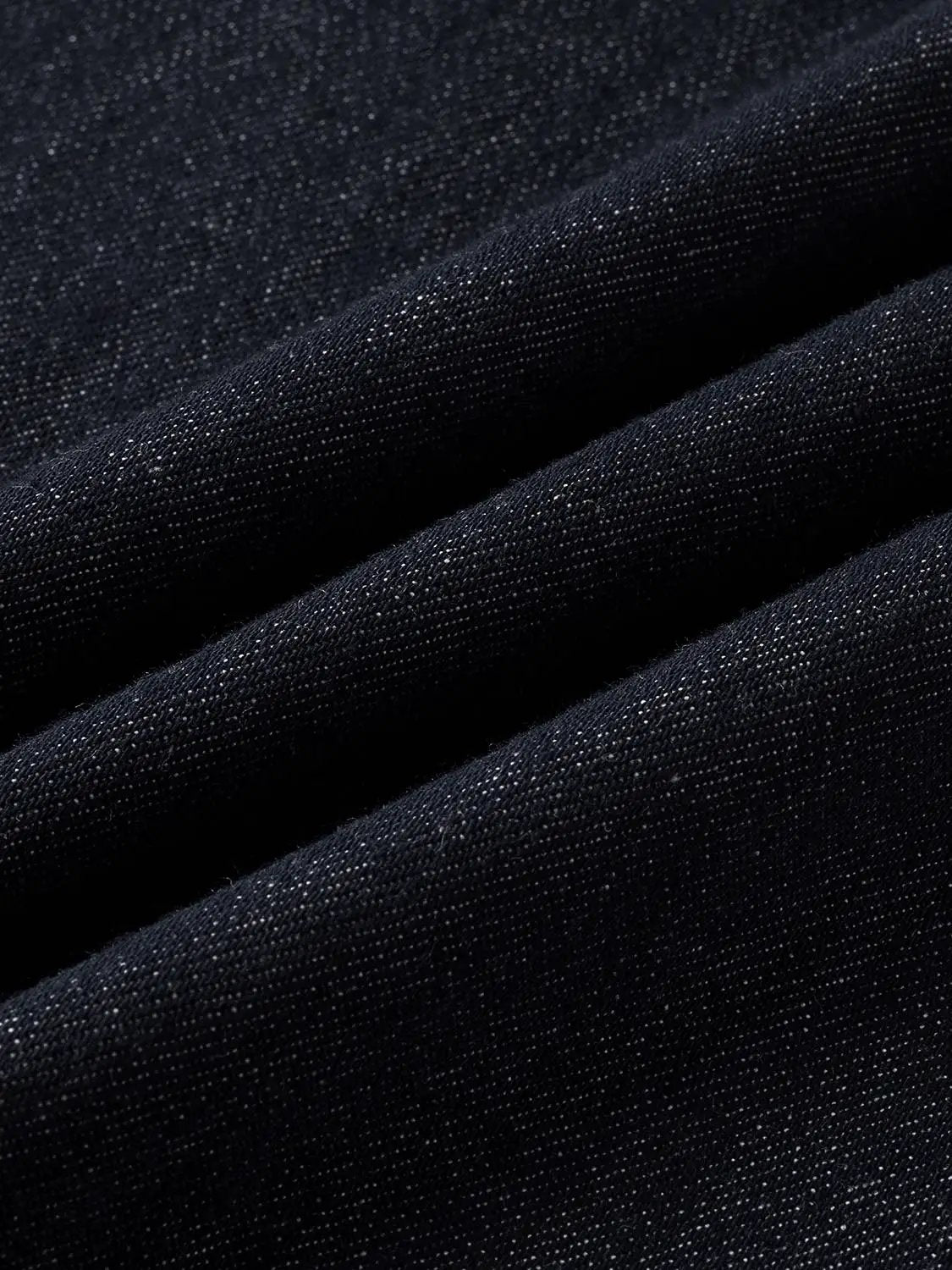 Vintage Indigo Denim Shirt fabric close-up with speckled weave texture