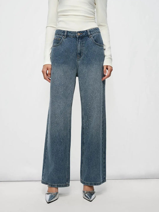 Jean large taille mi-haute à délavage décoloré et ornements
