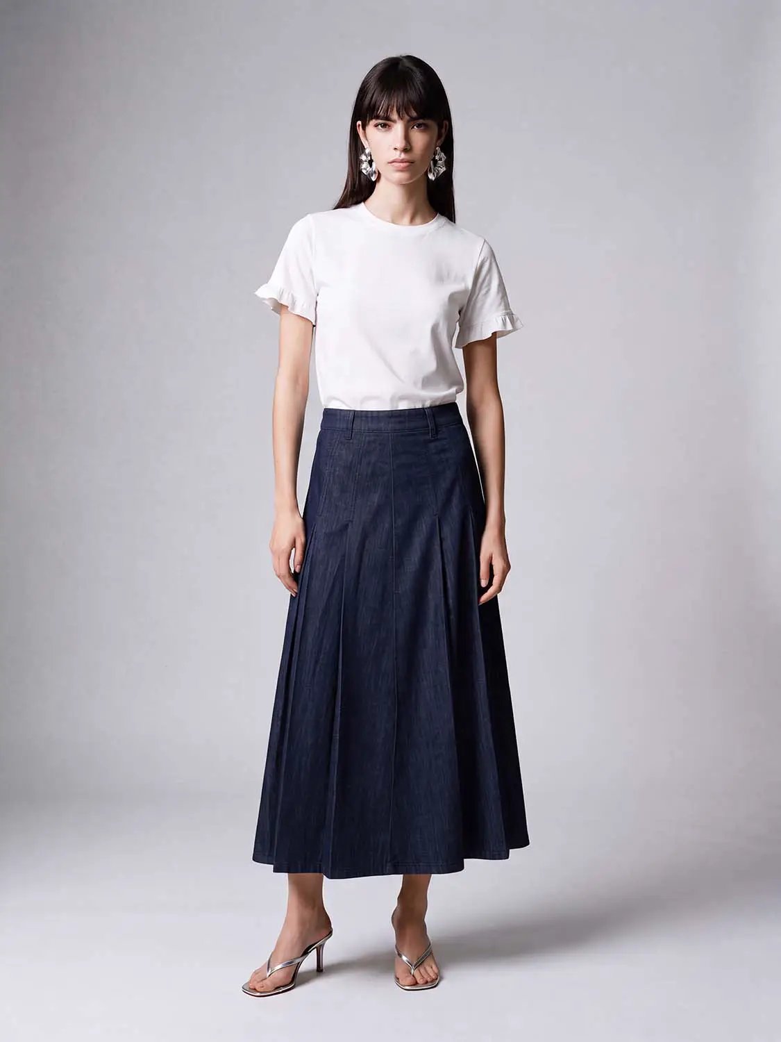 Denim skirt by Urban Revivo Fashion, navy midi-length A-line with front panel detailing.