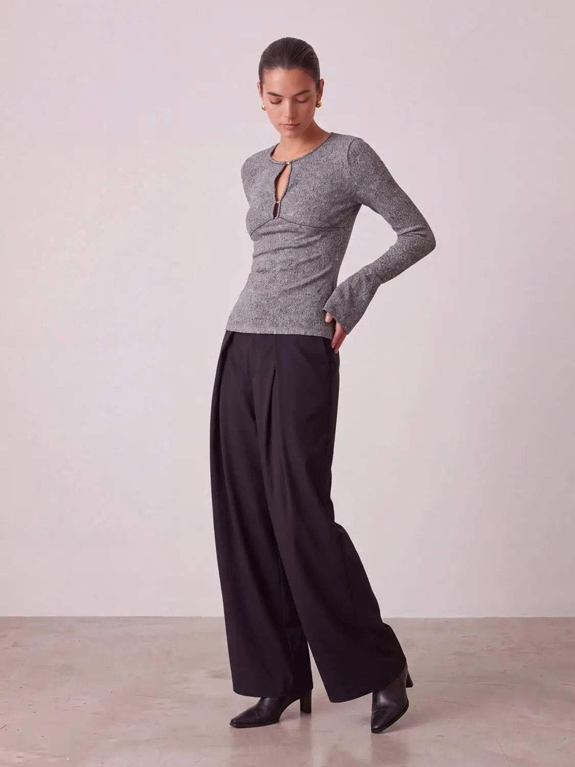 Flare Sleeve Knitted T-Shirt in grey knit, paired with black wide-leg pants