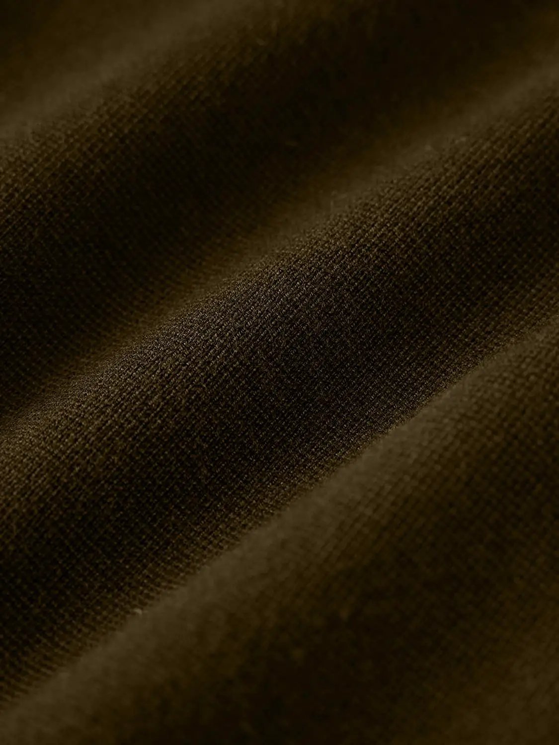 Wrap V-neck batwing knitted cardigan fabric in brown with textured knit close-up