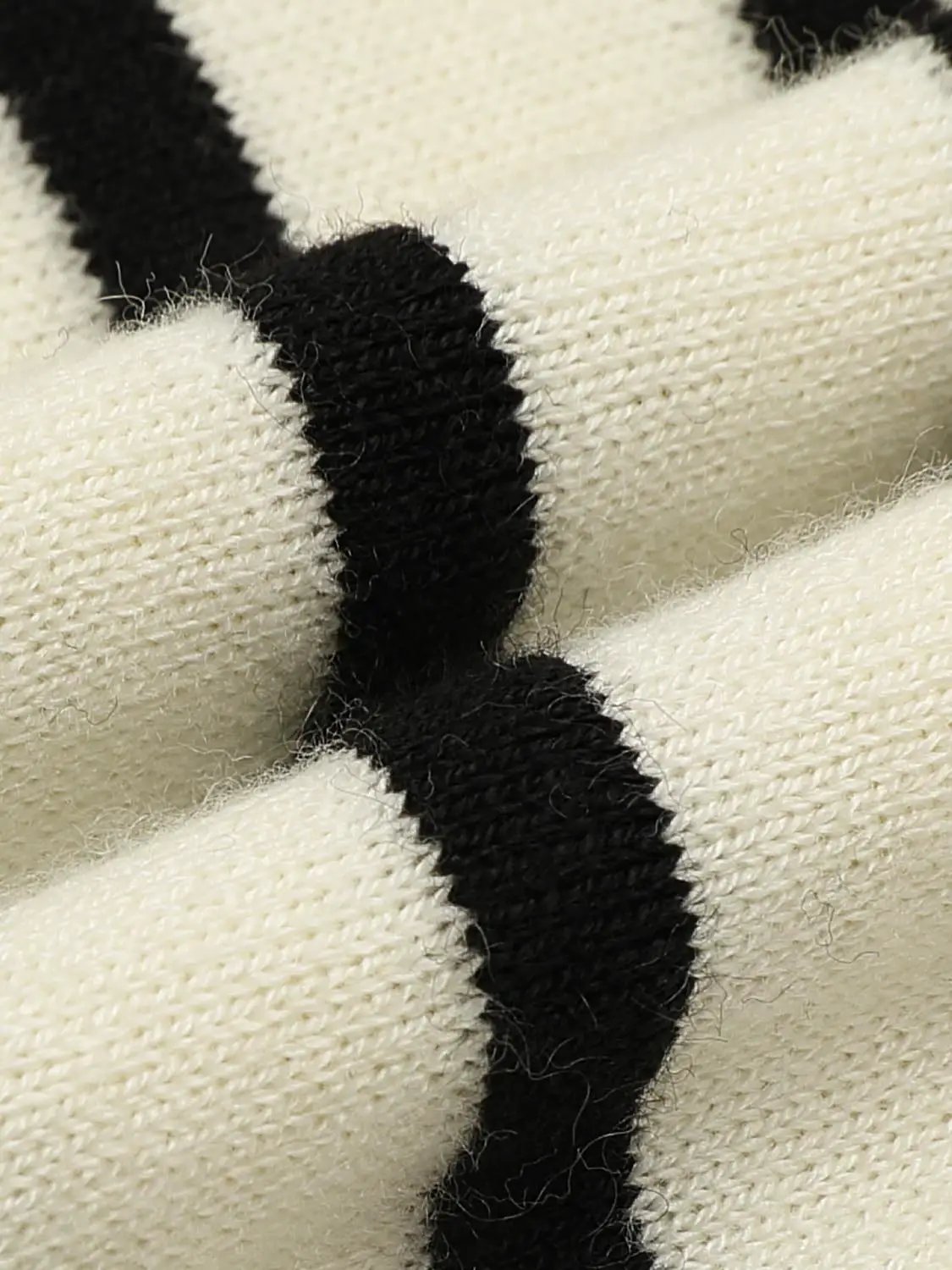 Knit Jacket: cream knit with bold black stripe pattern.
