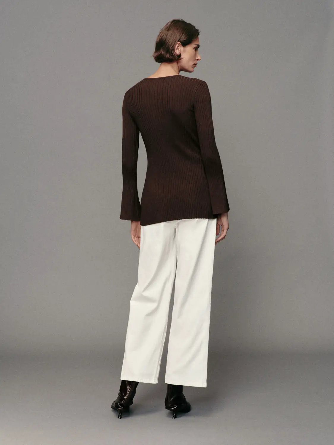 Ribbed button-front long-sleeve knit jacket in chocolate brown with split hem