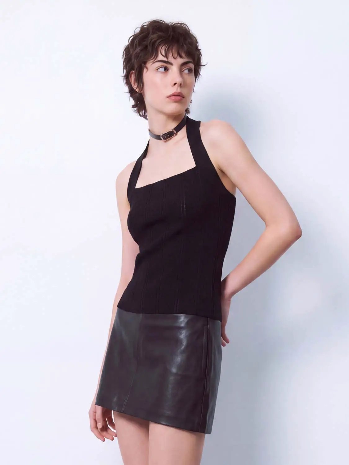 Knitted T-shirt, black rib-knit sleeveless top with a fitted silhouette for a chic look.